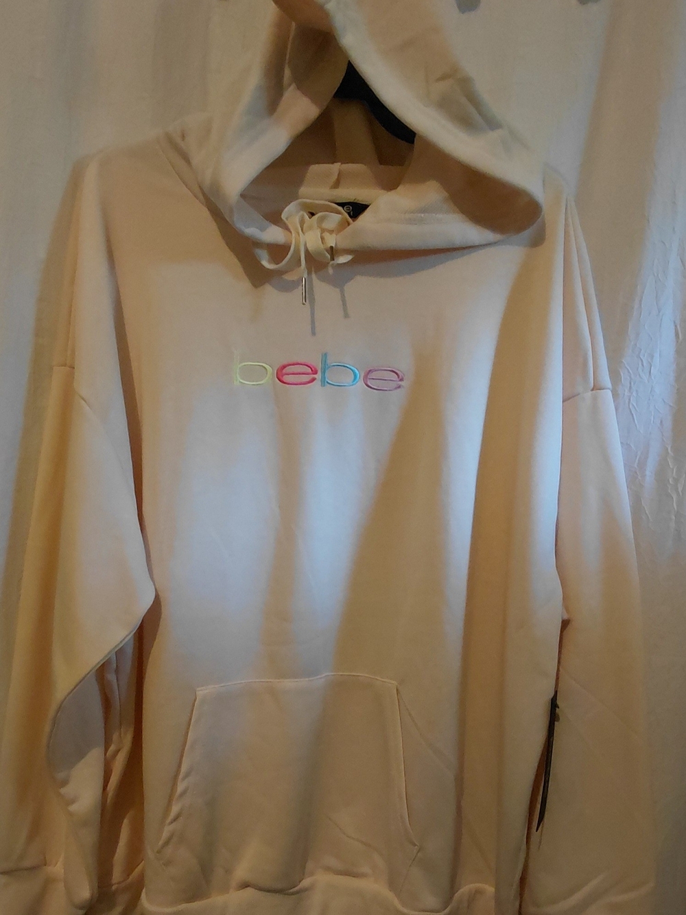 bebe Logo Hoodie in a soft cream